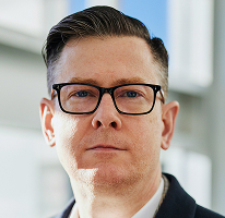 Alexander Hughes kriptovaluta-kereskedési cég vezérigazgatójának portréja